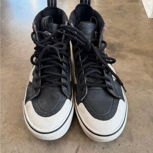 Vans Black and White High-Top Sneakers
